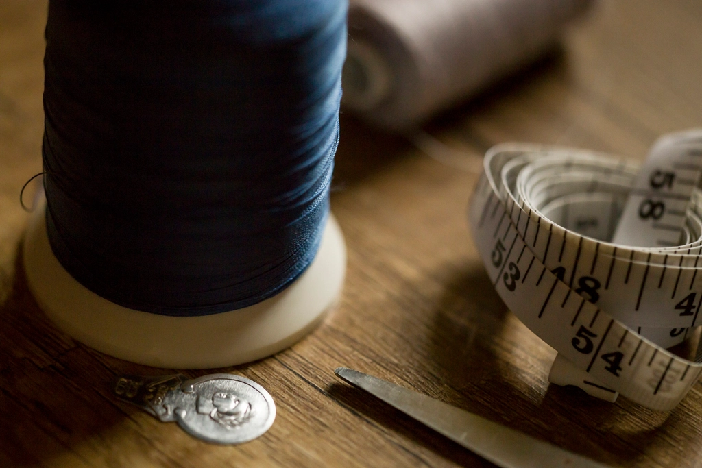 Thread, scissors and a tape measure
